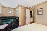 Middle queen bedroom with jacuzzi tub